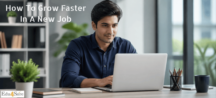 Focused young professional working on a laptop in a modern office, representing fast career growth and success in a new job.